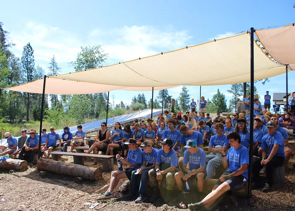 Young people gathered together at Shiloh's outdoor amphitheater